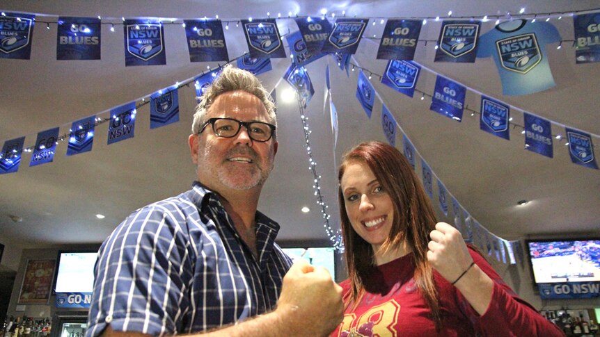 Blues supporter Martin Scanlan pictured with Maroons supporter Casey Bunston at the Gold Coast Parkwood Tavern.
