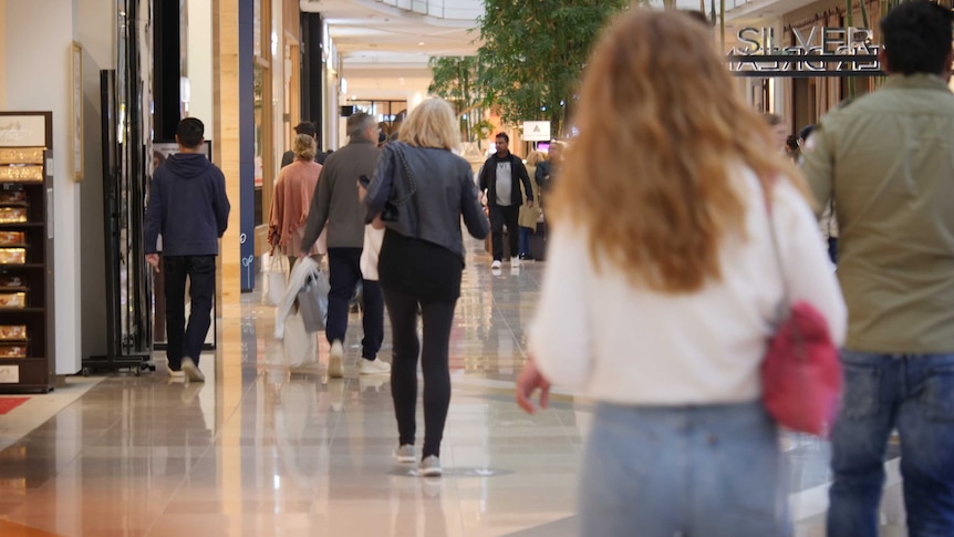 People walk through the Chadstone Shopping Centre