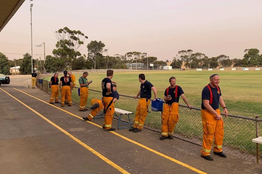 Firefighters on an oval