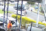 A screencap of CCTV footage showing the moment a bus started moving towards a petrol station at Casino, NSW.