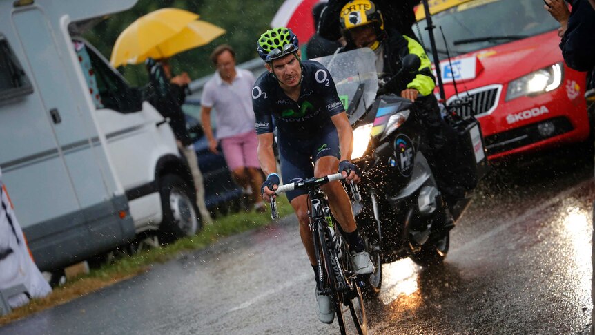 Portugal's Rui Costa rides through the rain on stage 19 of the Tour de France.