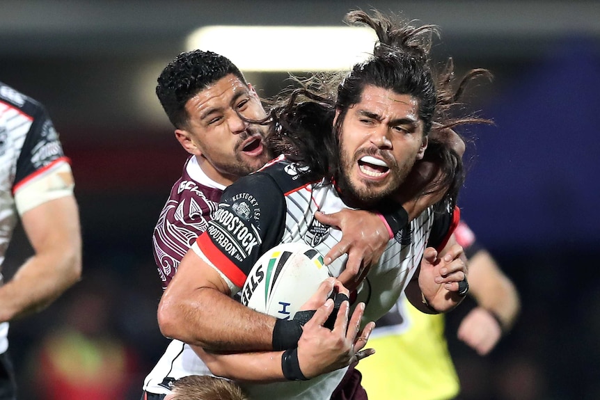 Warriors' Tohu Harris tackled against Manly