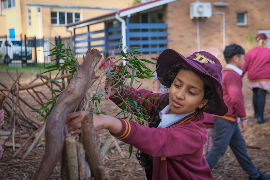 A student building a den.