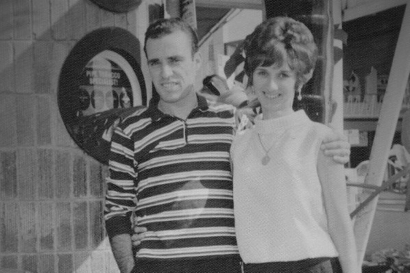Black and white photo of a man and a woman.