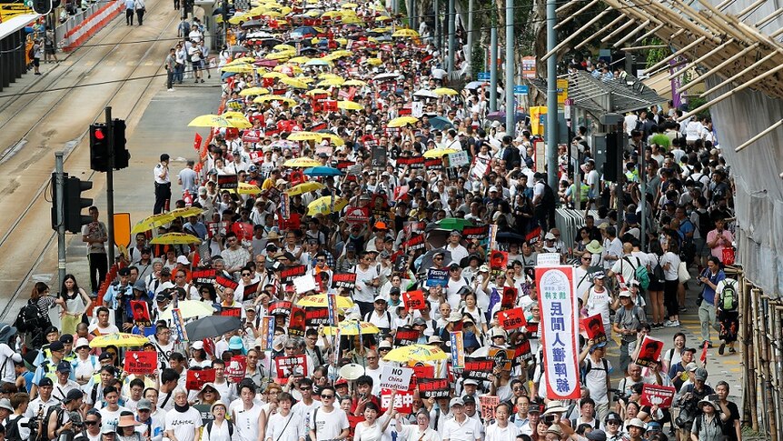 Demonstrators attend a protest to demand authorities scrap a proposed extradition bill with China.