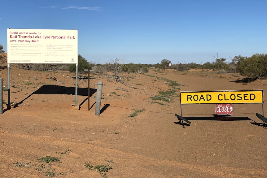 Signage saying road closed.