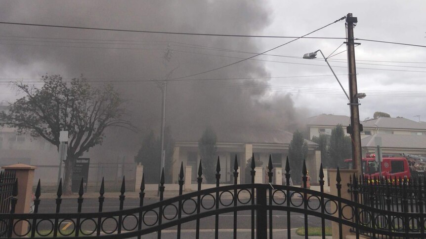 Smoke from Finniss Street house fire