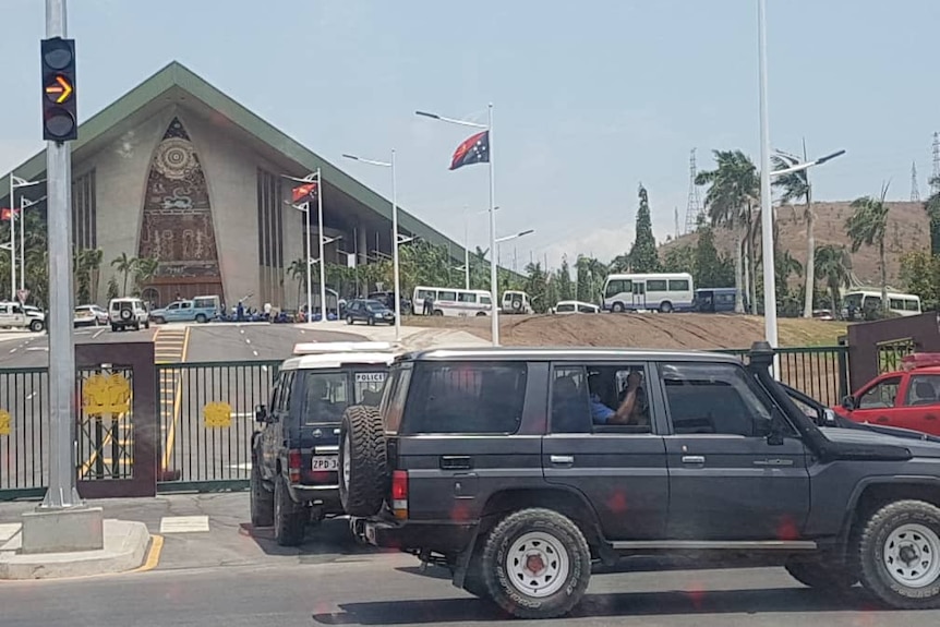 Police cars seen outside the Parliament building after the APEC summit.