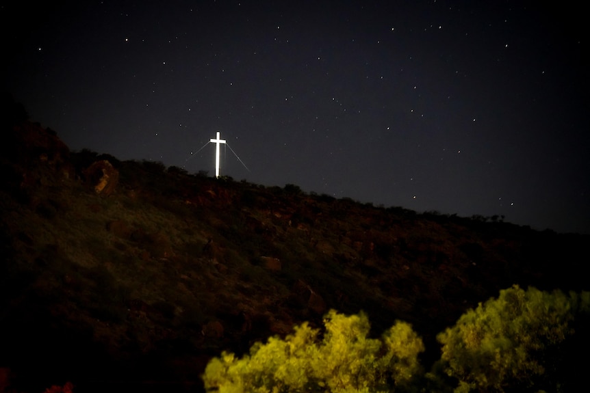 A large cross on a mountain
