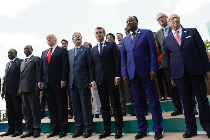 World leaders pose for a 'family' photo at the G7 summit in Sicily.