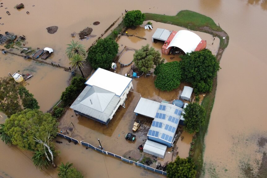 Aerial shot of submerged house.