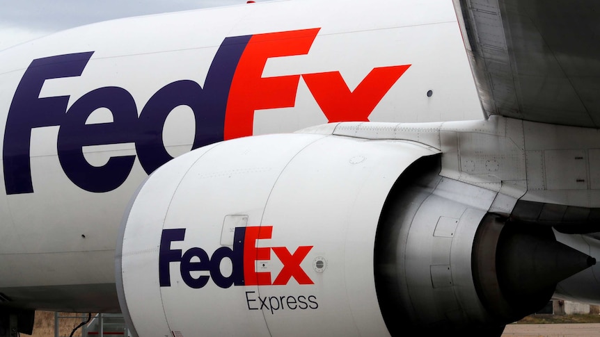 FedEx logo on a plane.