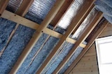 Foil insulation covers a roof cavity