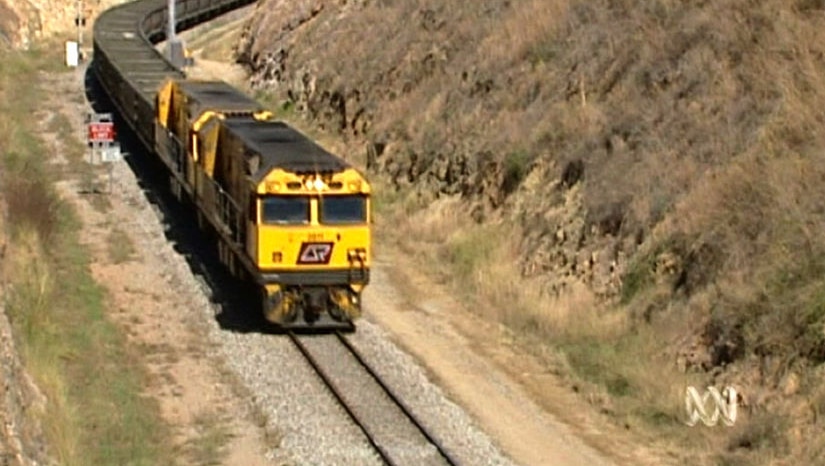 Long coal trains cannot stop quickly for motorists.