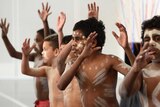 Children dance during an Indigenous-health policy announcement