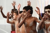 Children dance during an Indigenous-health policy announcement