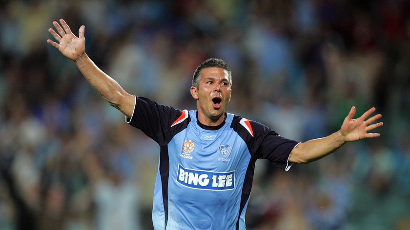 Sydney FC striker Steve Corica celebrates after scoring a goal