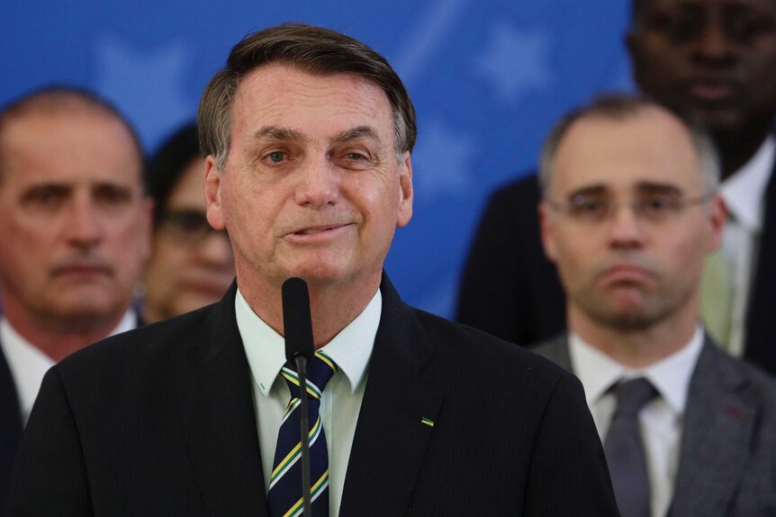 Brazil's President Jair Bolsonaro speaks during a press conference.