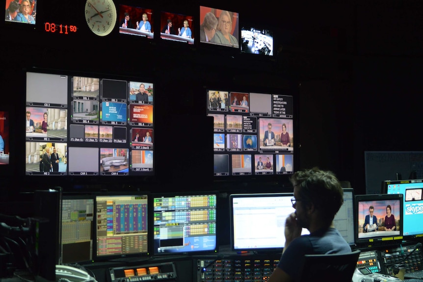 A director for ABC News Breakfast working in the TV news control room at ABC Melbourne.