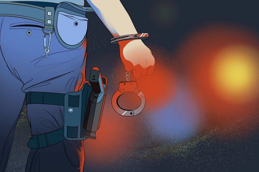 An illustration shows a police officer's hand in cuffs