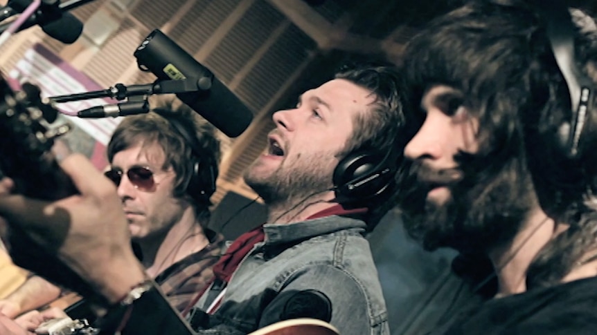 An image of Kasabian performing 'I'm So Tired' in the triple j studios