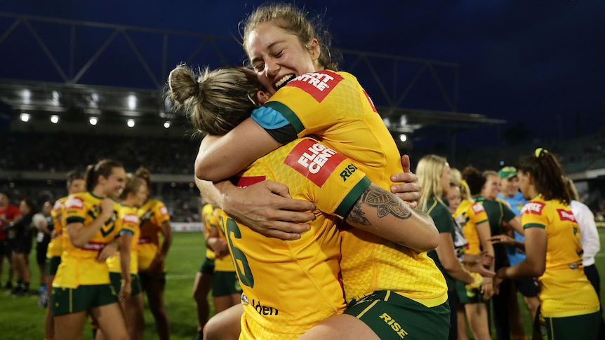 Kezie Apps hugs Kirra Dibba after a Jillaroos win