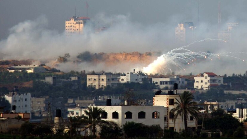 An artillery shell explodes over Beit Hanun in the northern Gaza Strip