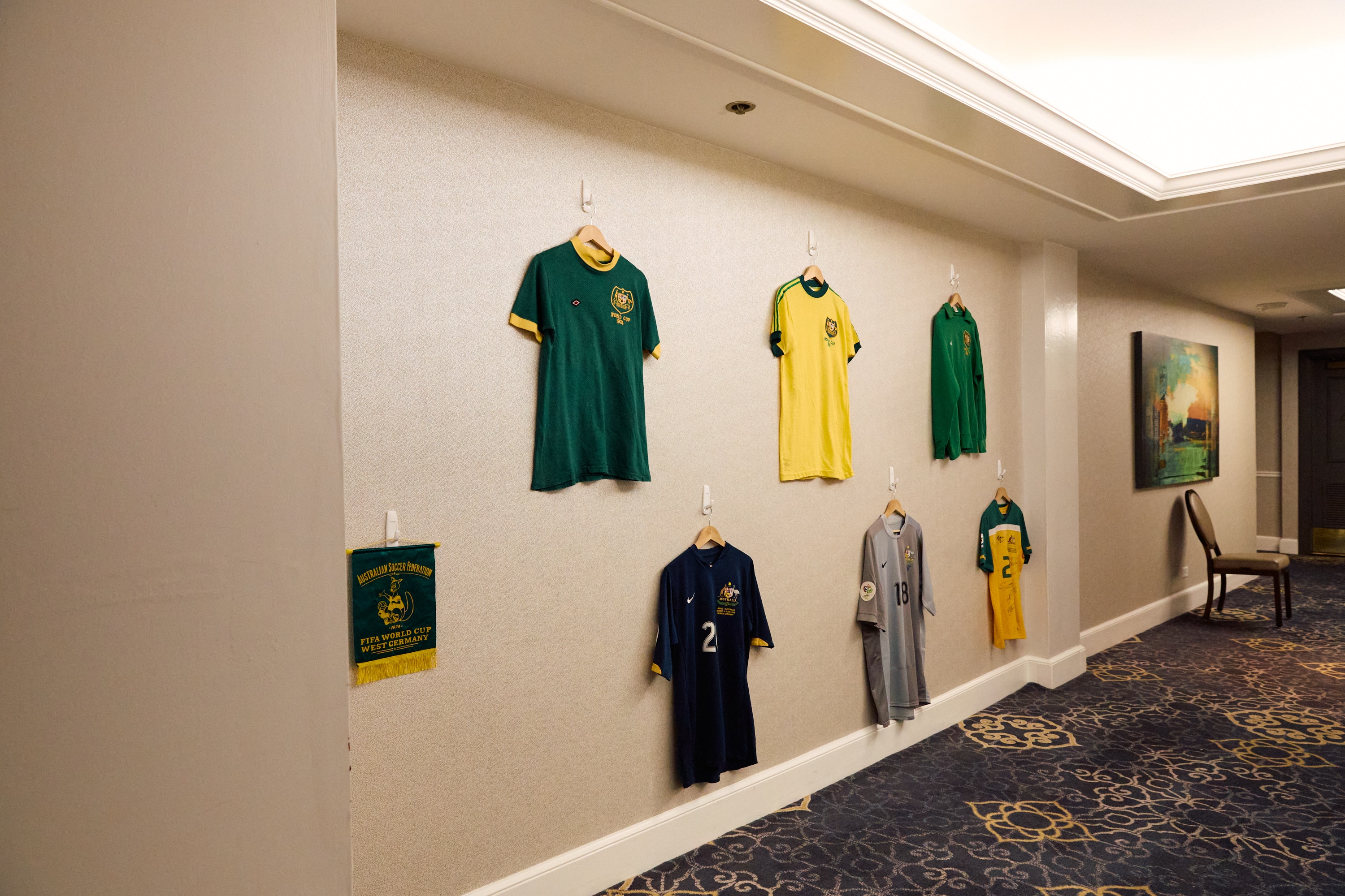 Socceroos jerseys from every World Cup campaign hang on the walls of the Claremont Country Club