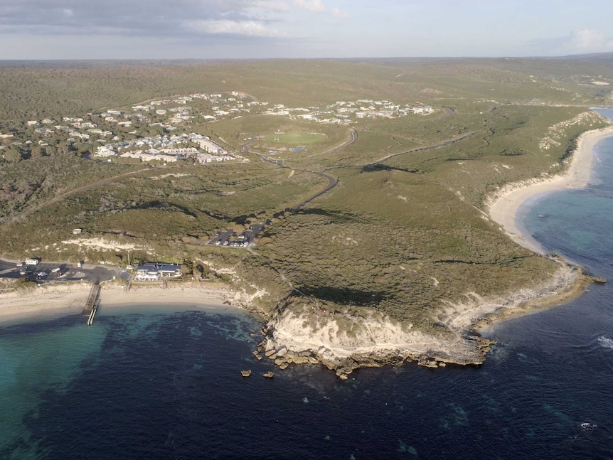 An aerial shot of the Gnarabup beach front showing sandy cliffs and forested area.