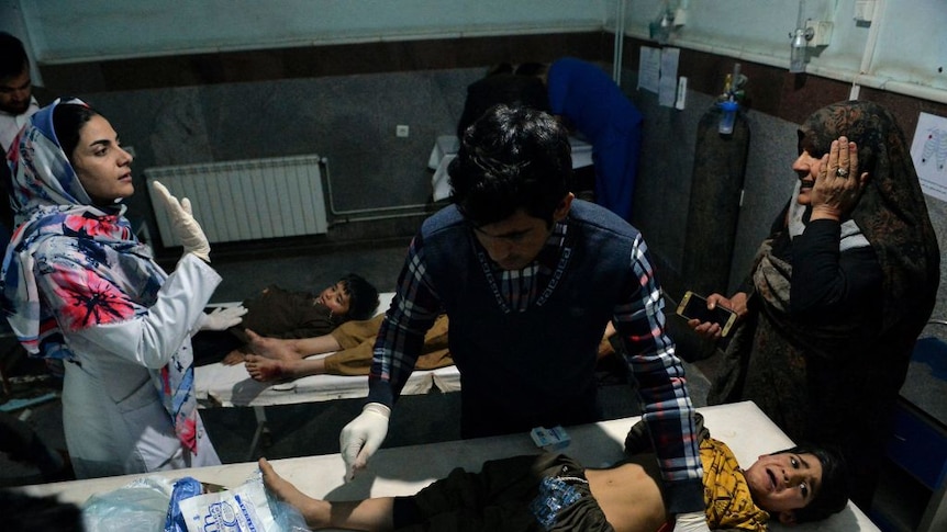 Children wounded in a car bomb blast receive treatment at a hospital in Herat.