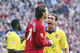 Martin Keown of Arsenal and Ruud Van Nistelrooy of Manchester United
