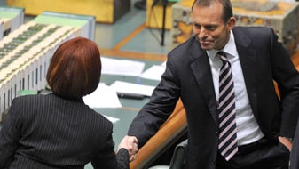 Tony Abbott congratulates new Prime Minister Julia Gillard during Question Time in Canberra on June 24, 2010 (AAP)