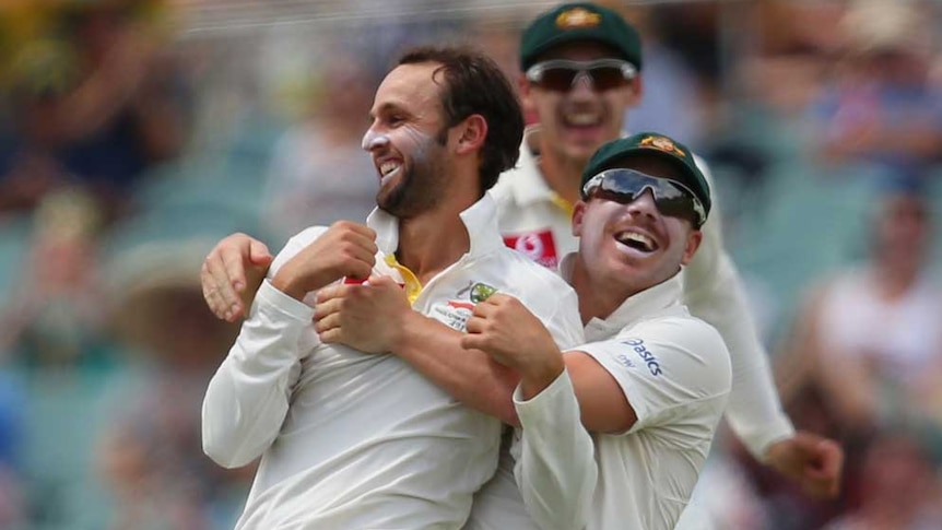 Australia's Nathan Lyon is congratulated after dismissing South Africa's Hashim Amla on day four in Adelaide.