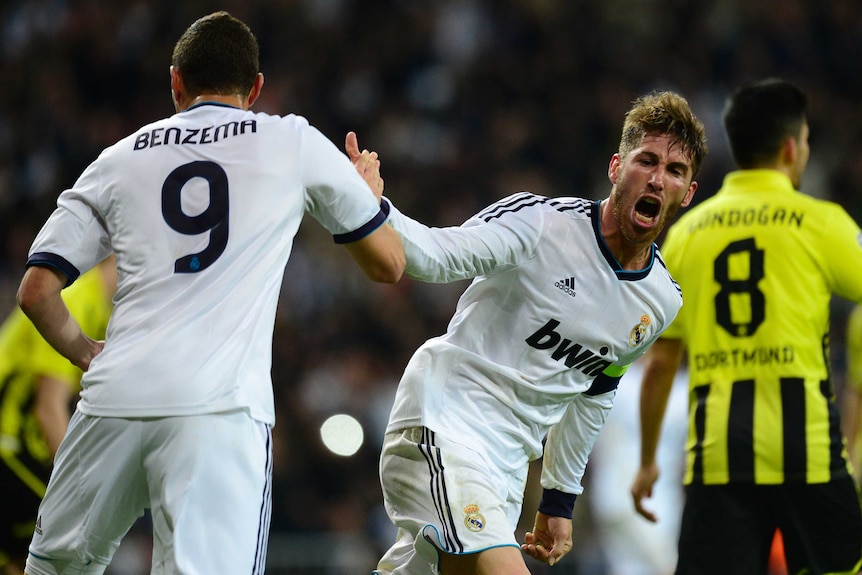 Glimmer of hope ... Real Madrid defender Sergio Ramos celebrates after putting his side 2-0 up on the night.