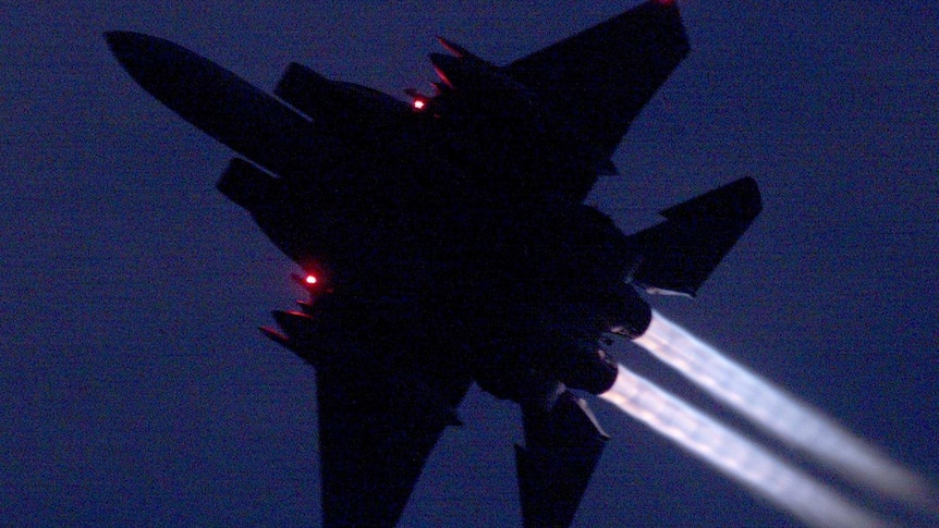 US F-15 flying at night