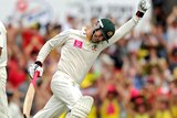 Michael Clarke celebrates scoring 200 on day two of the second Test at the SCG.