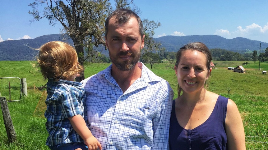 Man and woman standing in a green paddock