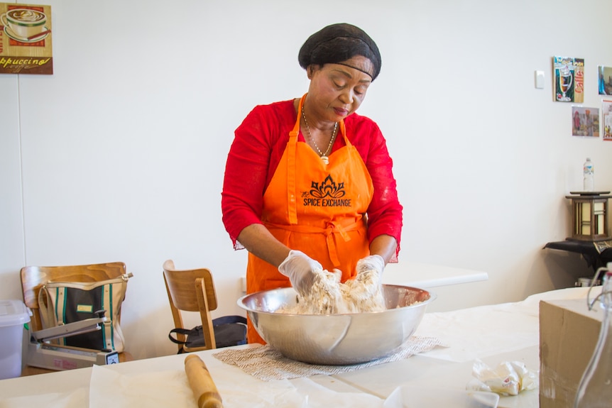 Salima Muzima working at The Spice Exchange.