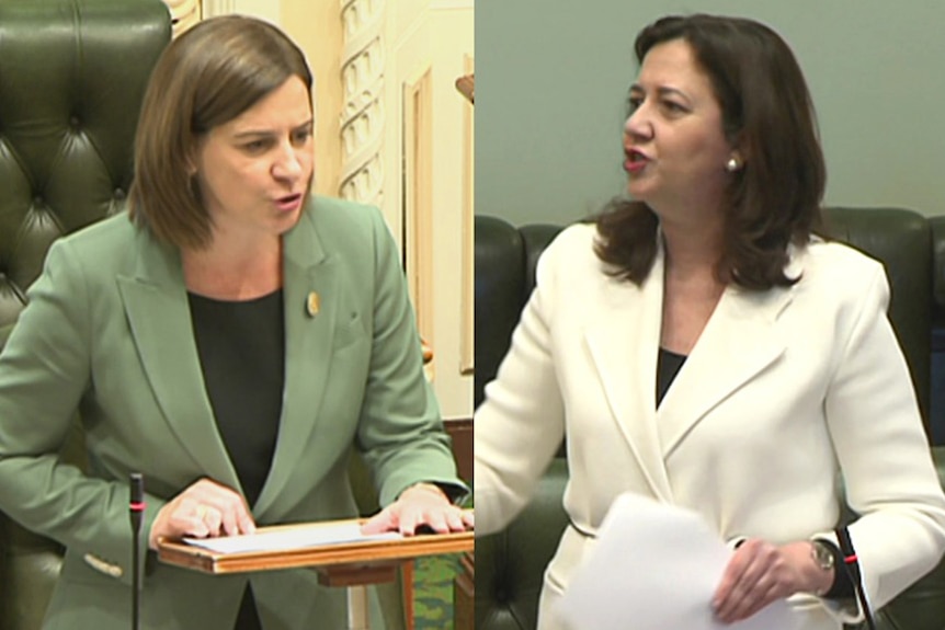 Two women speaking inside state parliament