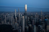 New York's skyline at sunset, with the sun catching the tallest building