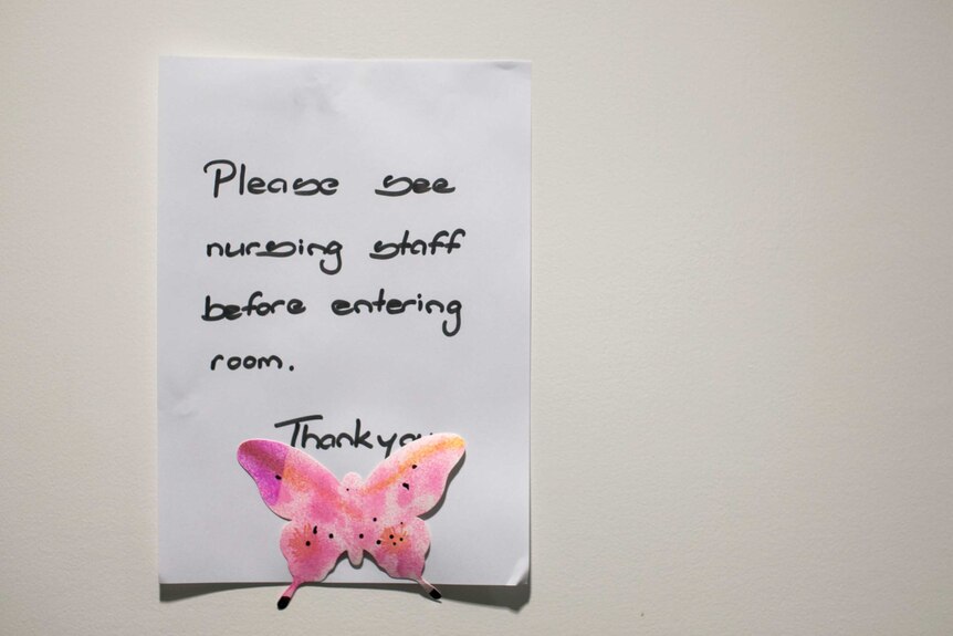 Sign on door reading "Please see nursing stuff before entering", The Mater Hospital Sydney, August 2016