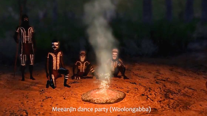 An animated group of Aboriginal people sit around a camp fire.