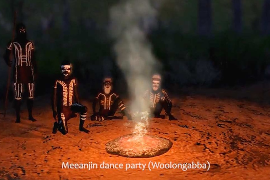 An animated group of Aboriginal people sit around a camp fire.