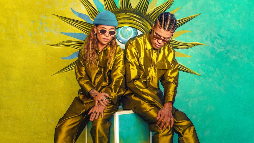 Yellow and teal press shot of Tash Sultana and Jerome Farah