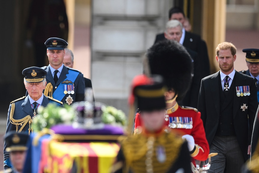 King Charles, Prince William and Prince Harry behind the Queen's coffin. 
