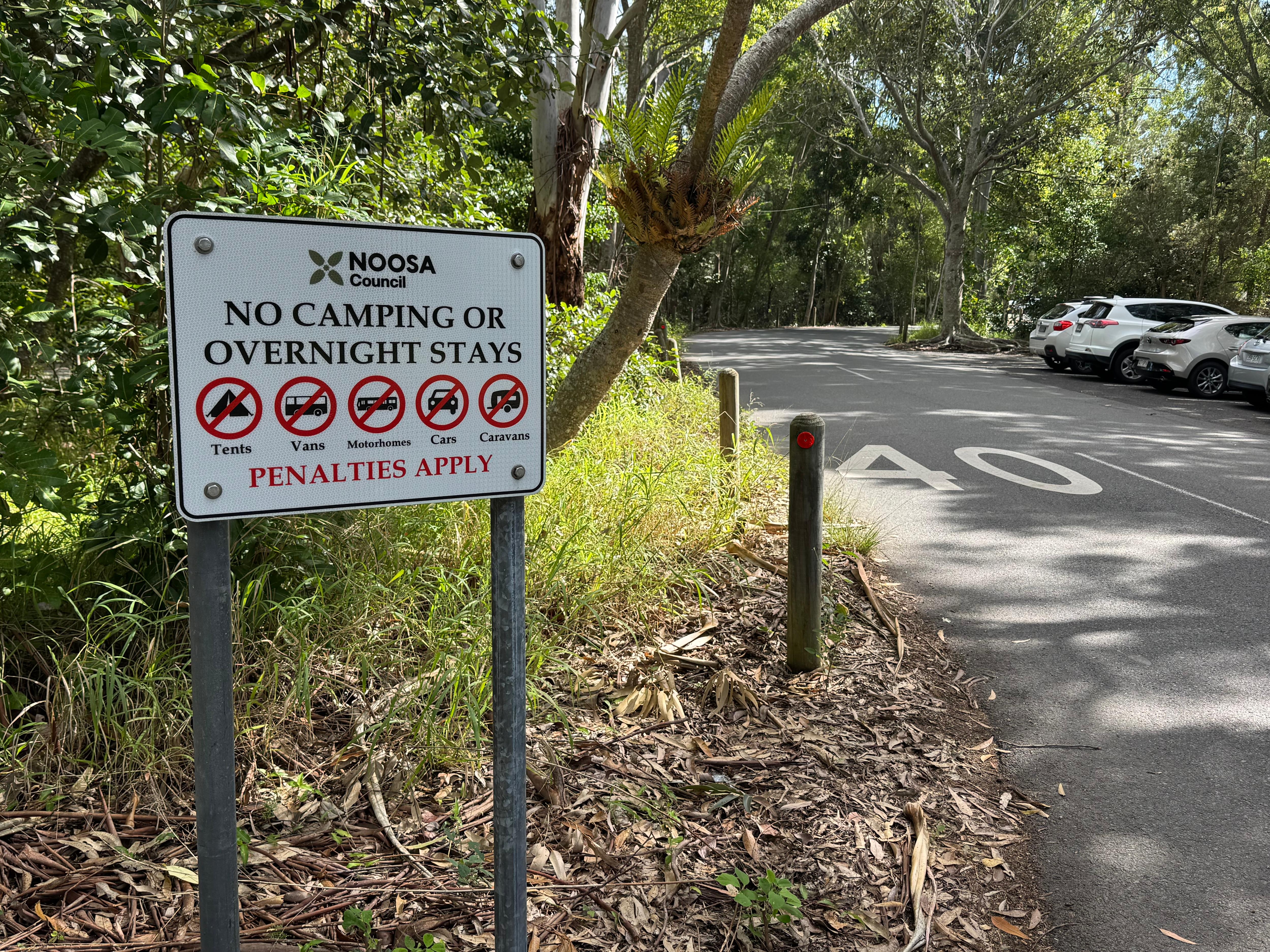 picture of a sign at Noosa saying no camping