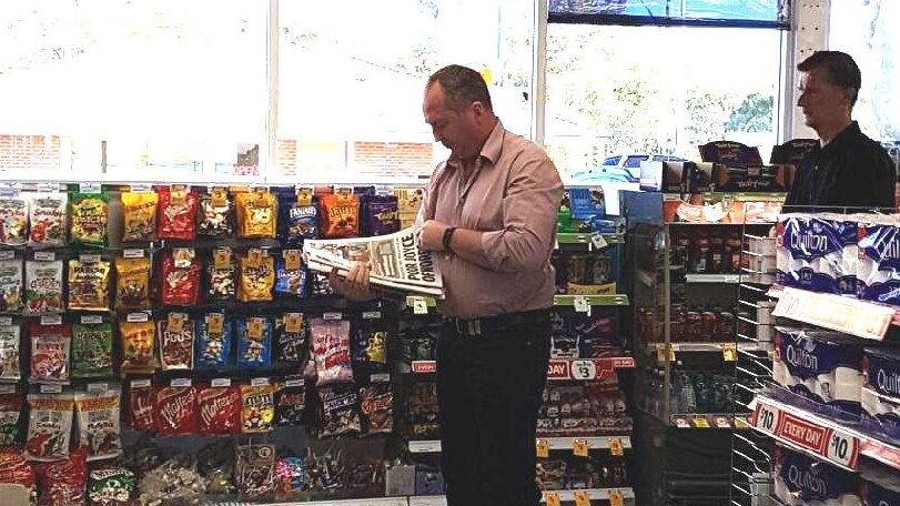 Barnaby Joyce reads headlines about himself