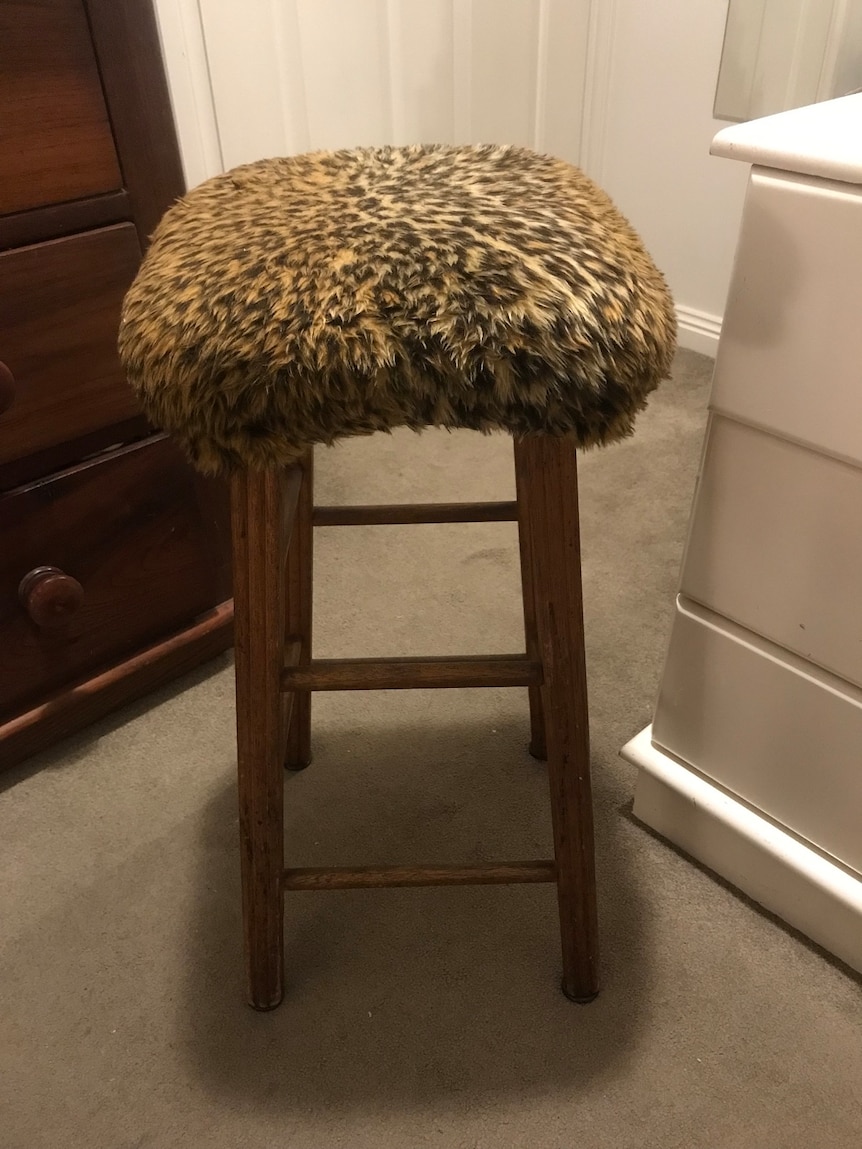 A fur covered bar stool