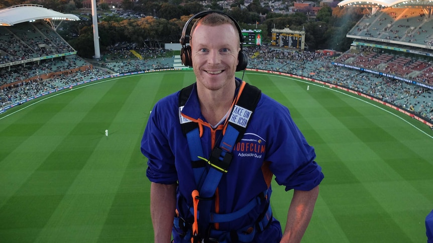 Chris Rogers on the roof of Adelaide Oval