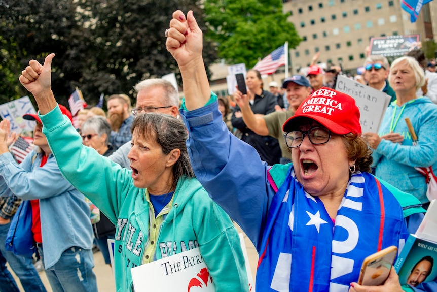 A crowd of Trump supporters rallies in the city of Lansing